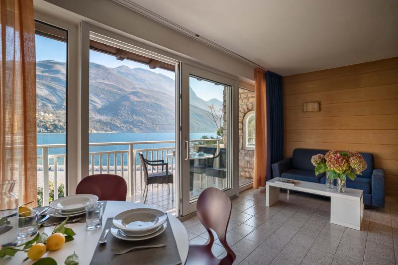 Delightful two-room holiday apartments with direct access to the beach in Torbole sul Garda