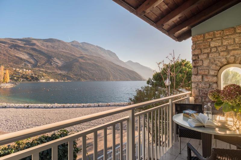 Delightful two-room holiday apartments with direct access to the beach in Torbole sul Garda