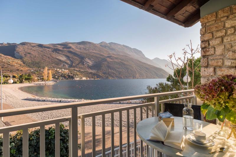 Delightful two-room holiday apartments with direct access to the beach in Torbole sul Garda