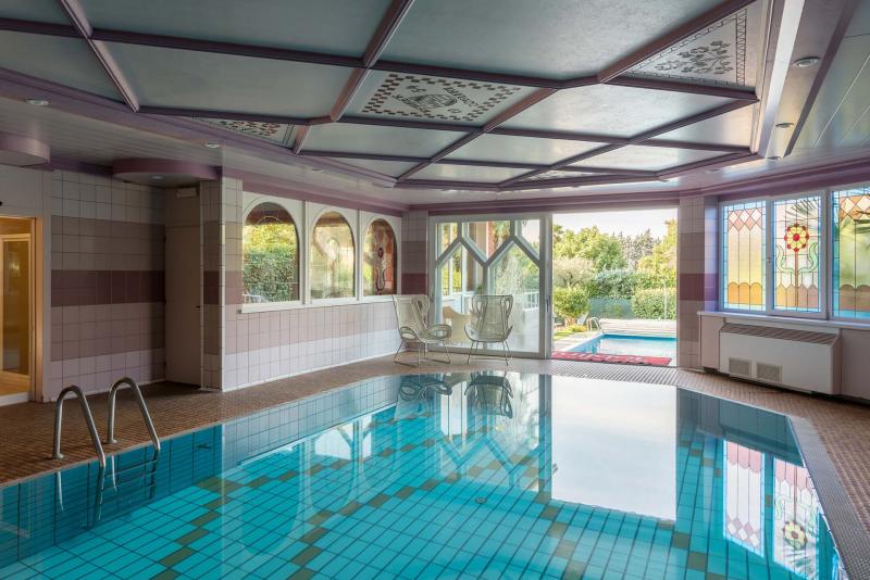 Residence con piscina a Torbole sul Garda ideale per le vacanze estive sul lago di Garda
